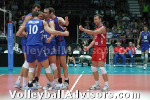 Russian volleyball team celebrates and haves fun in this photo. Enjoy the game!